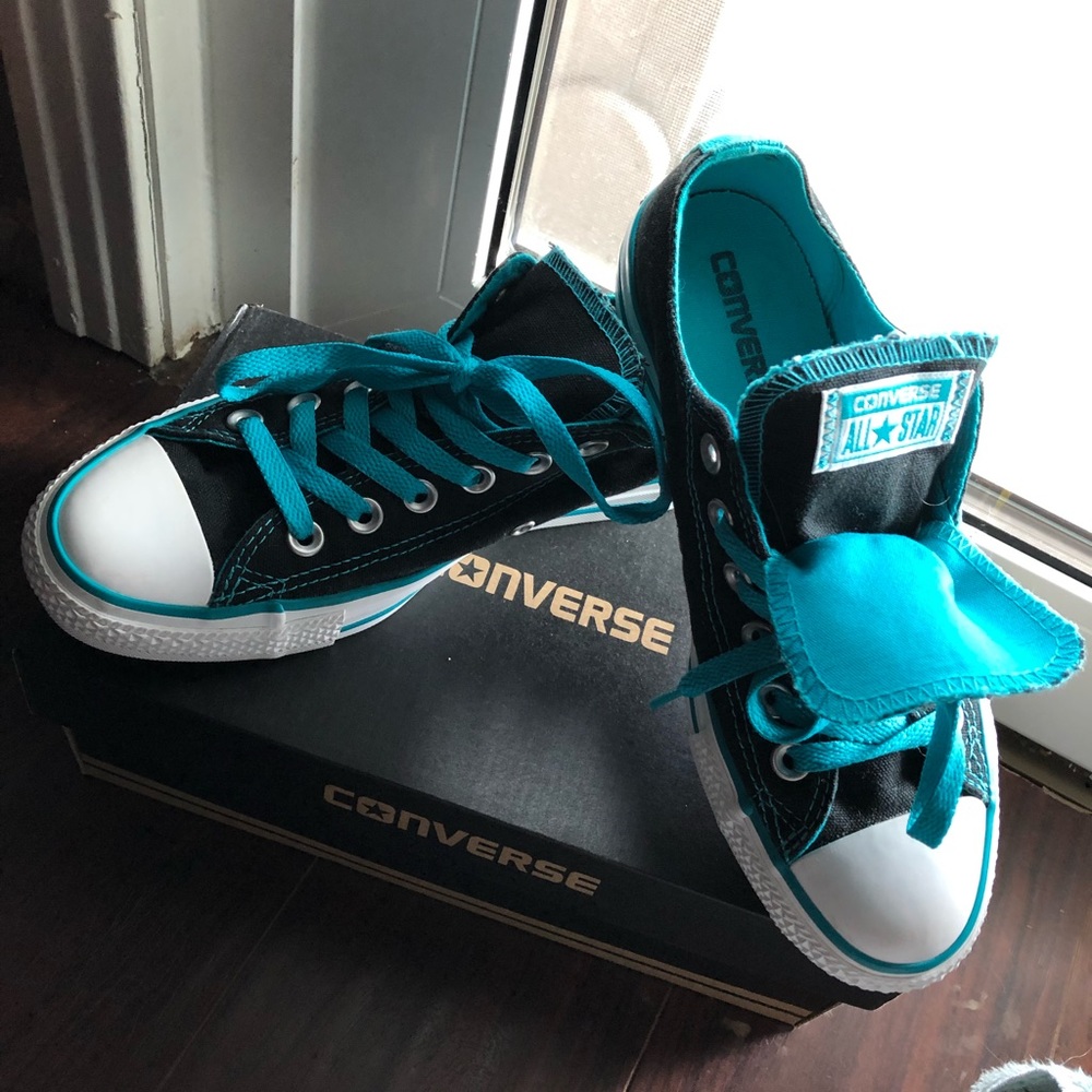 Blue and black converses